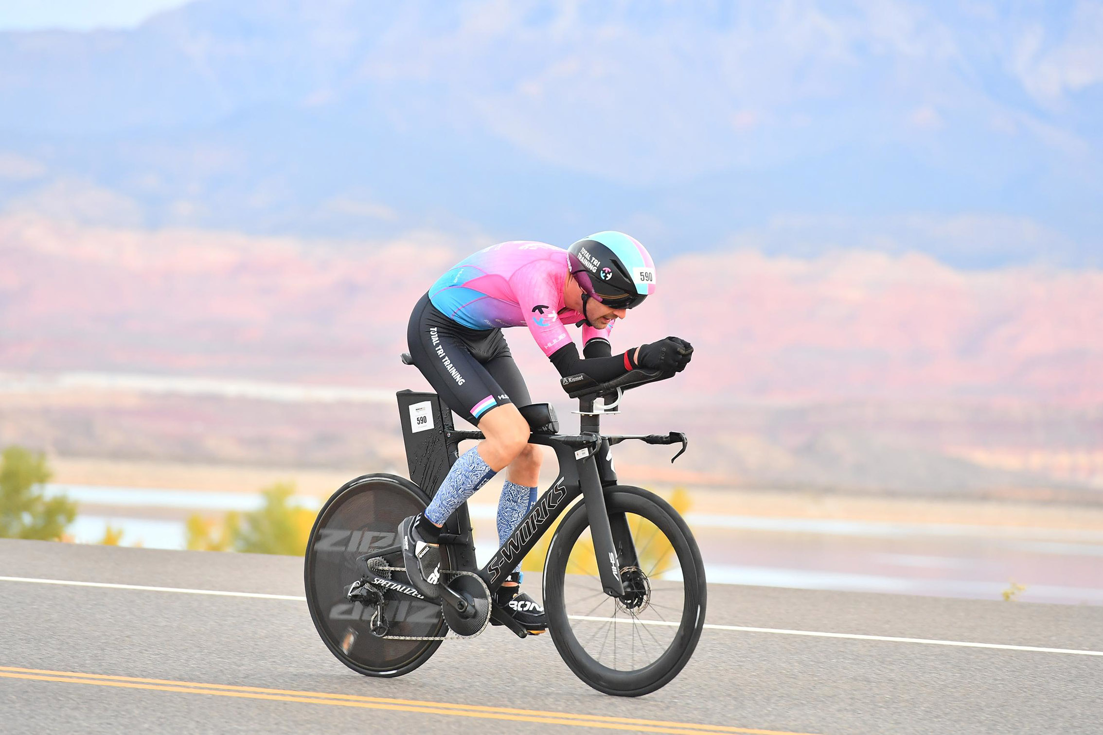 Total Tri Training athlete racing on a time trial bike